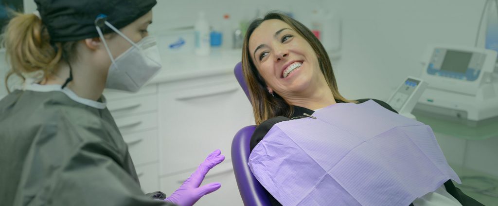 Woman smiling at the dental